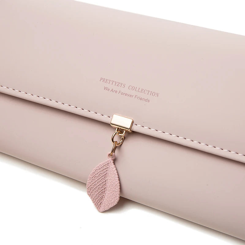 2024 Hot Selling spring and summer new women's PU leather small fresh leaf pendant three fold bag large capa