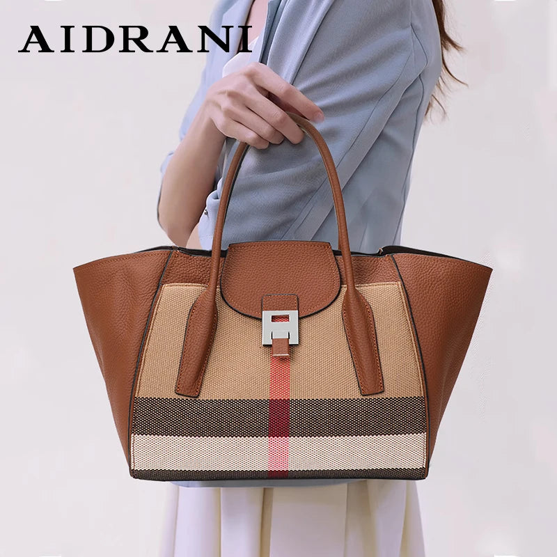 New 2024-2025 Checkered women's handbag 2024 fashionable canvas genuine leather bag large capacity multifunctional cowhide wing bag