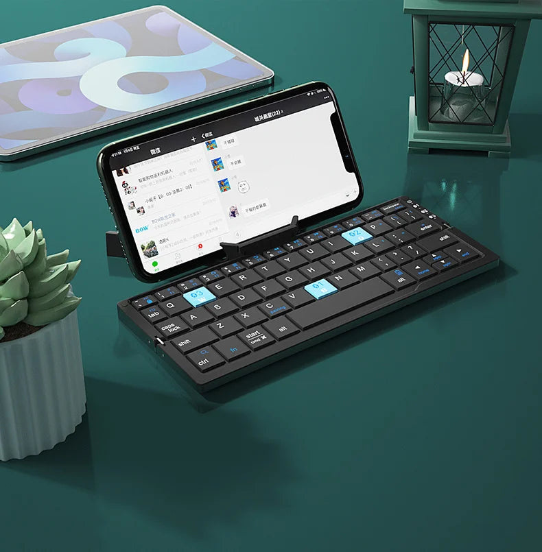 Our New 2025 collection  Foldable Bluetooth Keyboard Rechargeable Keyboard Mini Folding Wireless Keyboard Aluminum Keypad With Stand For Phone